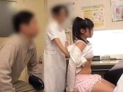 Asian doctor exam