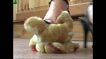 Feet crush teddy bear