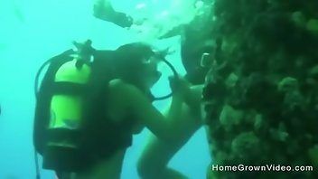 Sexy brunette hair underwater scuba