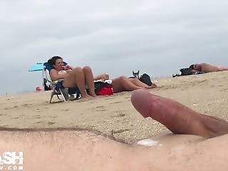 Chubby girls handjob cock on beach